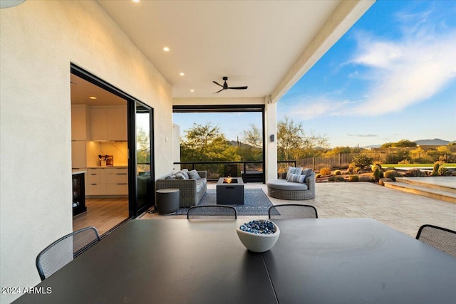 view of patio with an outdoor hangout area and ceiling fan