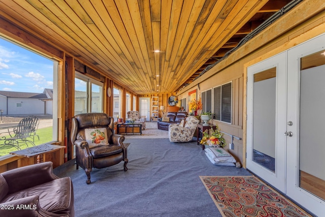 sunroom featuring french doors and wood ceiling