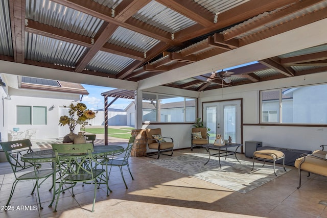 view of patio with french doors and ceiling fan