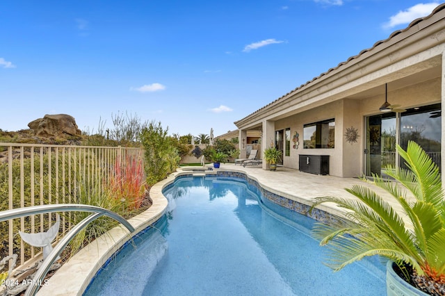 view of pool featuring a patio