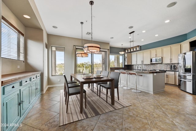 tiled dining space with sink