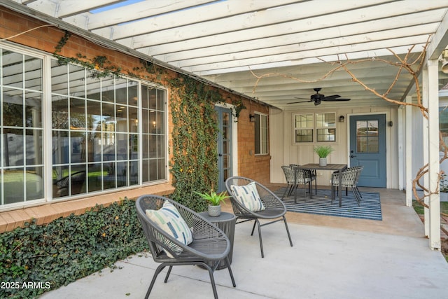 view of patio / terrace with outdoor dining area and ceiling fan