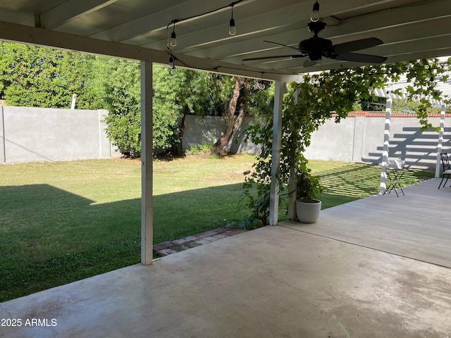 view of patio / terrace with a ceiling fan and a fenced backyard