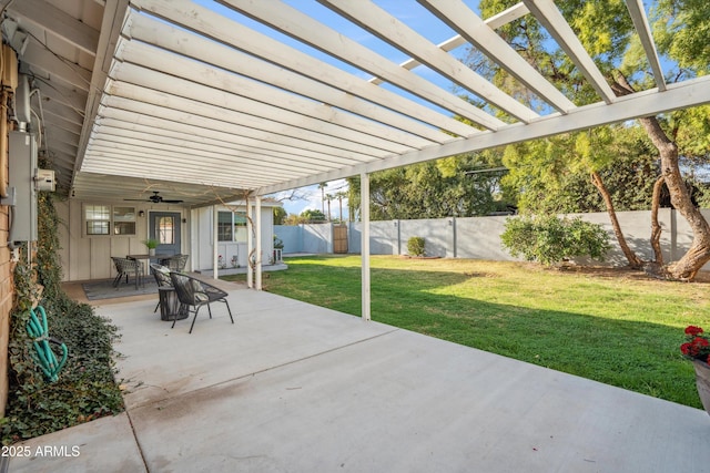 view of patio featuring a fenced backyard, ceiling fan, and a pergola