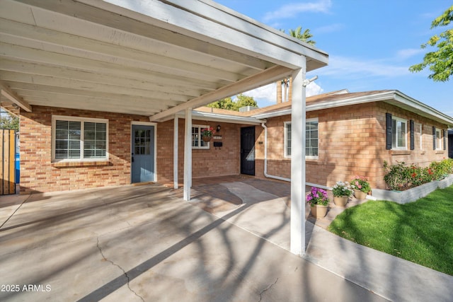 view of patio with an attached carport