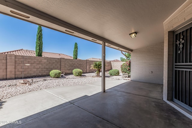 view of patio featuring a fenced backyard
