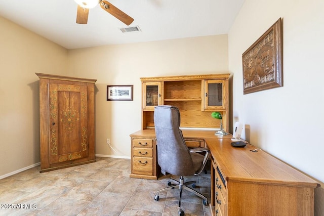 office area featuring baseboards, visible vents, and a ceiling fan