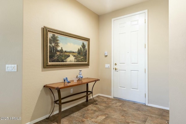 entrance foyer with baseboards