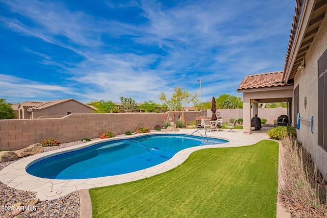 22026 N 44th Pl, Phoenix, AZ 85050 - view of swimming pool featuring a fenced in pool, a patio, a fenced backyard, and a yard