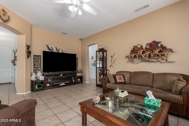 22026 N 44th Pl, Phoenix, AZ 85050 - living area featuring visible vents, a ceiling fan, arched walkways, and light tile patterned floors