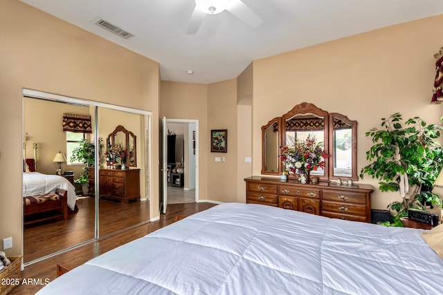 22026 N 44th Pl, Phoenix, AZ 85050 - bedroom with ceiling fan, visible vents, a closet, and wood finished floors