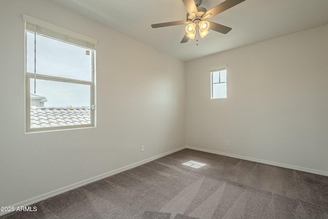 4090 E Bethena St, Gilbert, AZ 85295 - spare room featuring carpet flooring, a ceiling fan, and baseboards