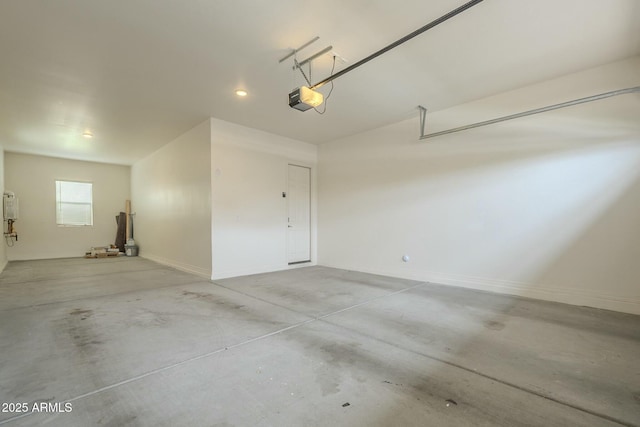 4090 E Bethena St, Gilbert, AZ 85295 - garage with baseboards and a garage door opener