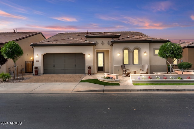 view of front of house with a garage