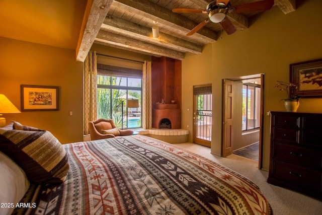 carpeted bedroom featuring access to outside, wood ceiling, and beam ceiling