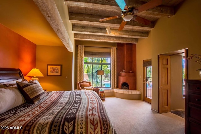 carpeted bedroom featuring beam ceiling and wooden ceiling