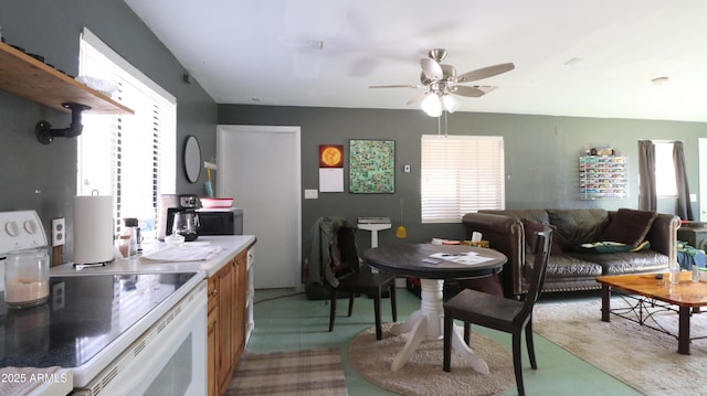 kitchen featuring open shelves, light countertops, white electric range, open floor plan, and ceiling fan