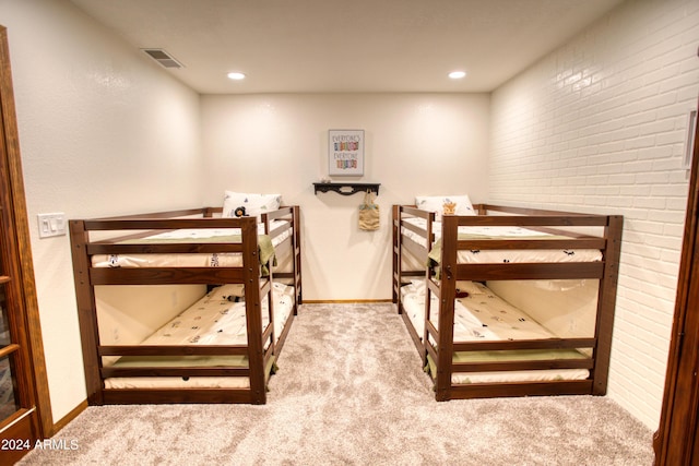 bedroom featuring visible vents, baseboards, and carpet flooring