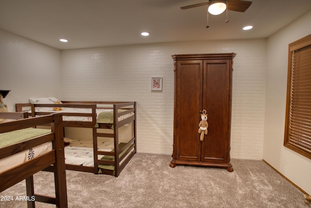 bedroom featuring light colored carpet and recessed lighting