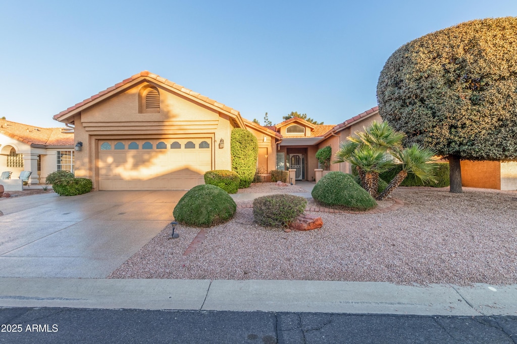 view of front of home with a garage