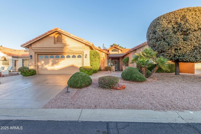 view of front of home with a garage