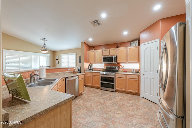 kitchen featuring light brown cabinets, recessed lighting, a sink, visible vents, and appliances with stainless steel finishes