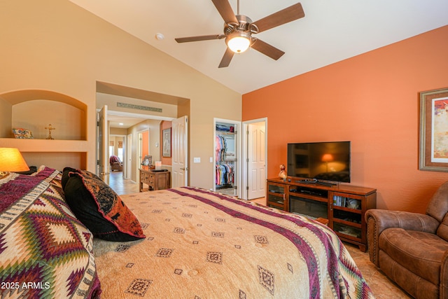 bedroom with high vaulted ceiling, a ceiling fan, and a closet