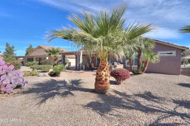 view of front of property featuring stucco siding