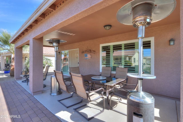 view of patio featuring outdoor dining space