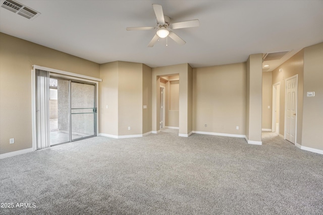 carpeted empty room featuring ceiling fan