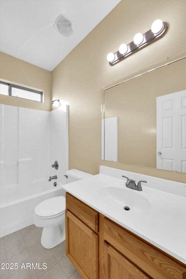 full bathroom featuring tile patterned floors, vanity, toilet, and bathing tub / shower combination