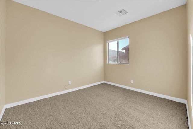 empty room featuring carpet flooring