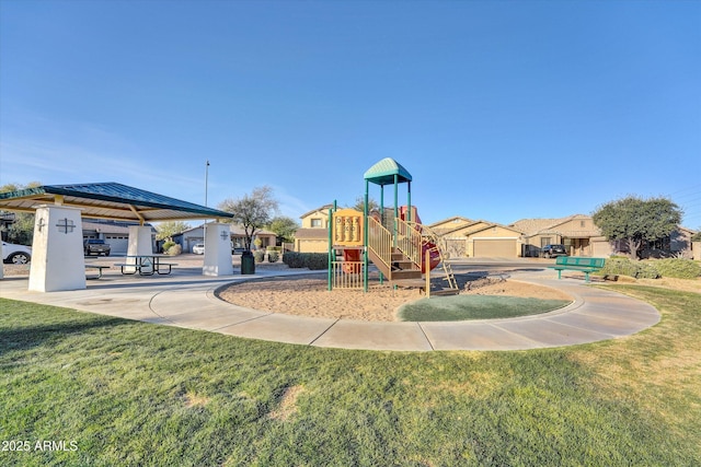 view of playground featuring a gazebo and a lawn