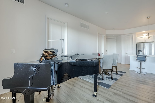 interior space with light hardwood / wood-style floors