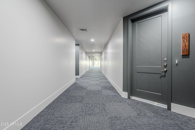 corridor with carpet floors