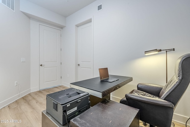 office featuring light hardwood / wood-style flooring