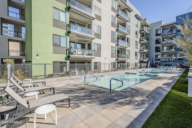 view of pool featuring a patio