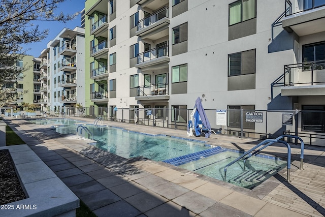 view of pool featuring a patio area