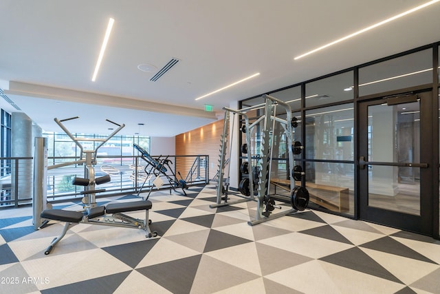 exercise room with expansive windows