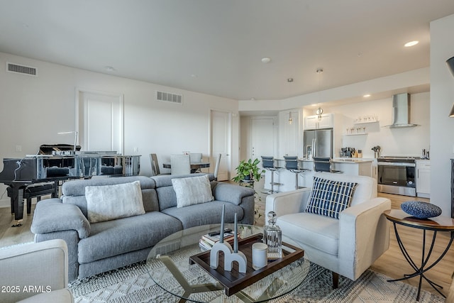 living room featuring light hardwood / wood-style flooring