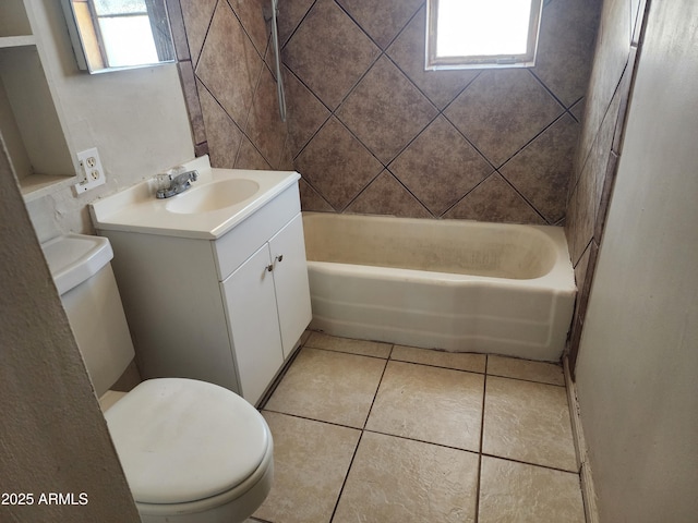 full bath featuring toilet, tile patterned flooring, bathtub / shower combination, and vanity