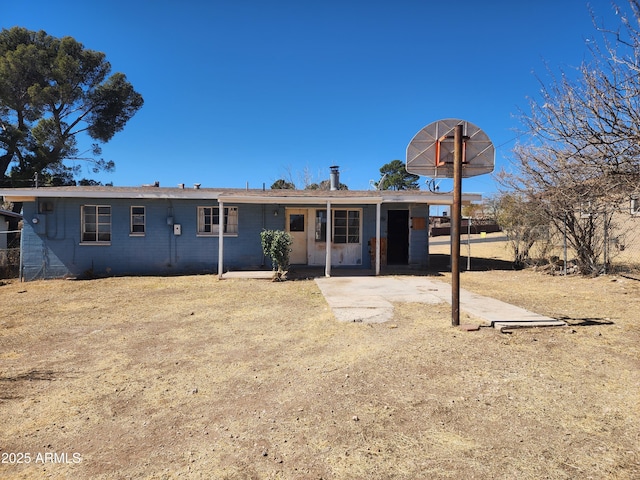 back of property featuring a patio area