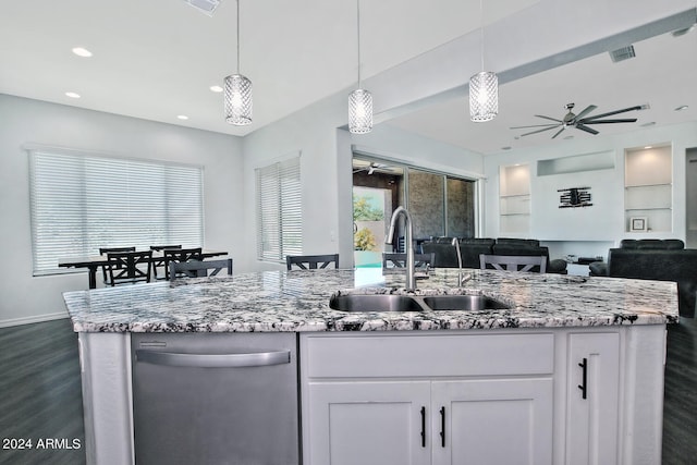 kitchen with white cabinetry, stainless steel dishwasher, dark hardwood / wood-style floors, sink, and ceiling fan