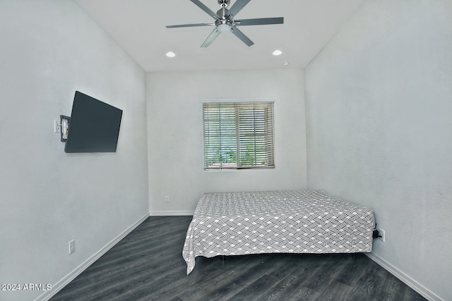 bedroom featuring ceiling fan and wood-type flooring