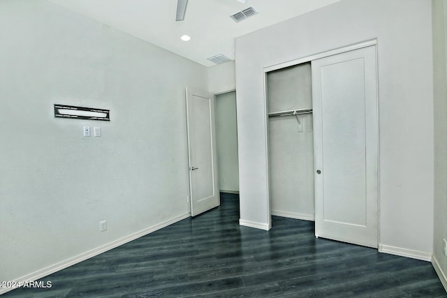 unfurnished bedroom with a closet, ceiling fan, and wood-type flooring