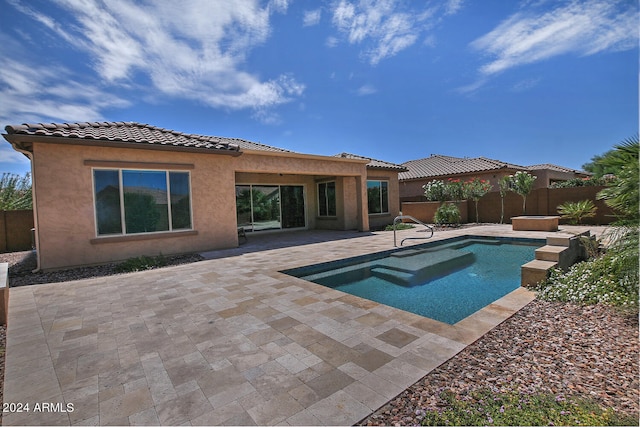 view of pool featuring a patio