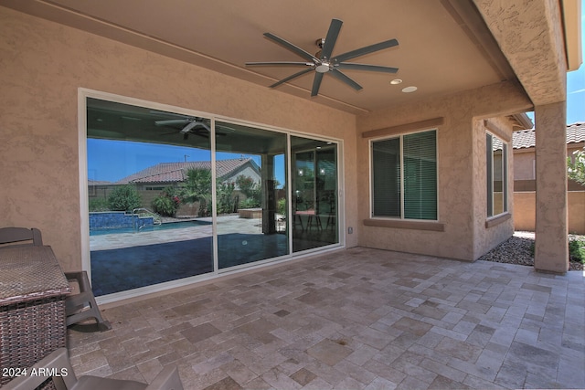 view of patio with ceiling fan