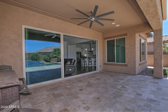 view of patio with ceiling fan