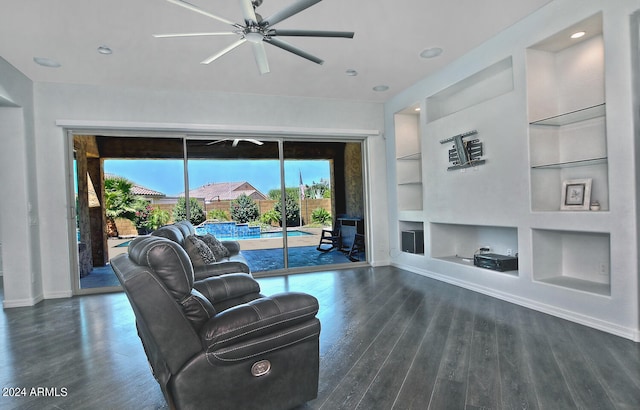 living room with ceiling fan, hardwood / wood-style flooring, and built in features