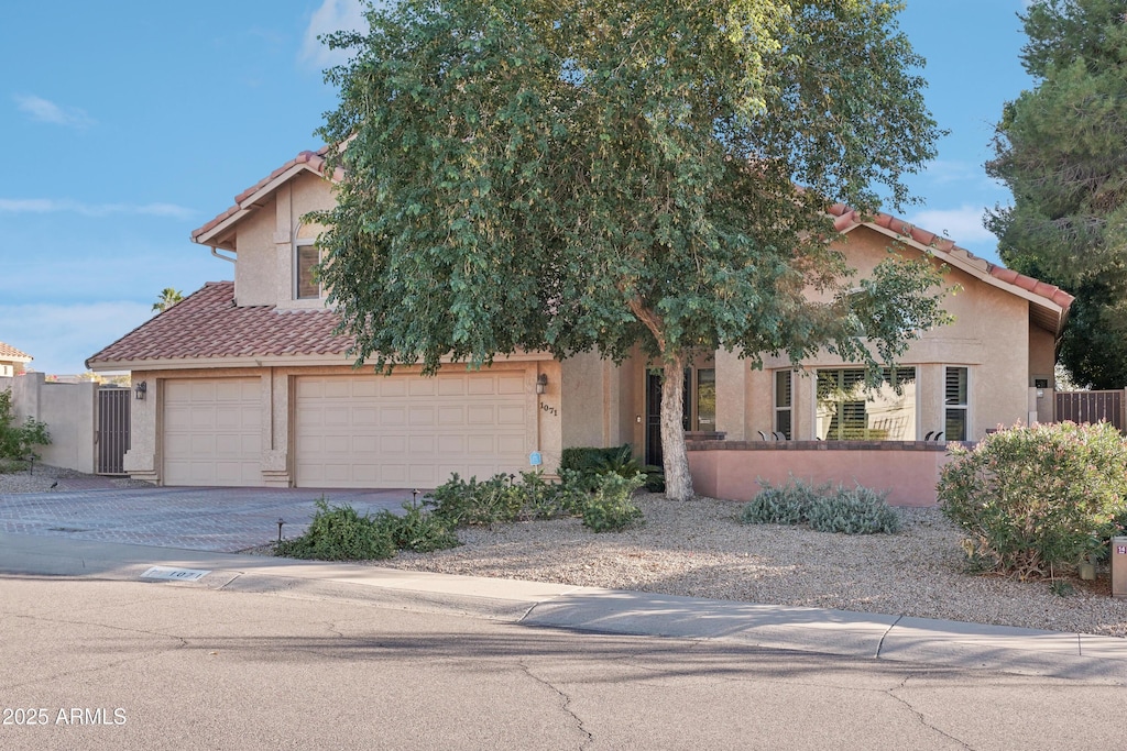 view of front of home with a garage